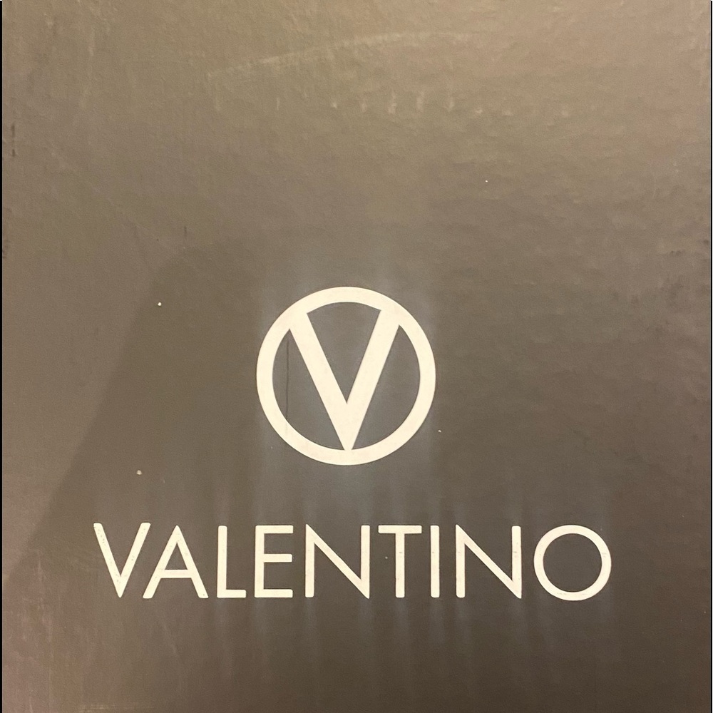 Valentino high top sneakers.